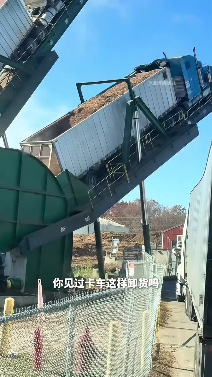 物流界的高效神器液压翻板卸车机让卸货快到飞起