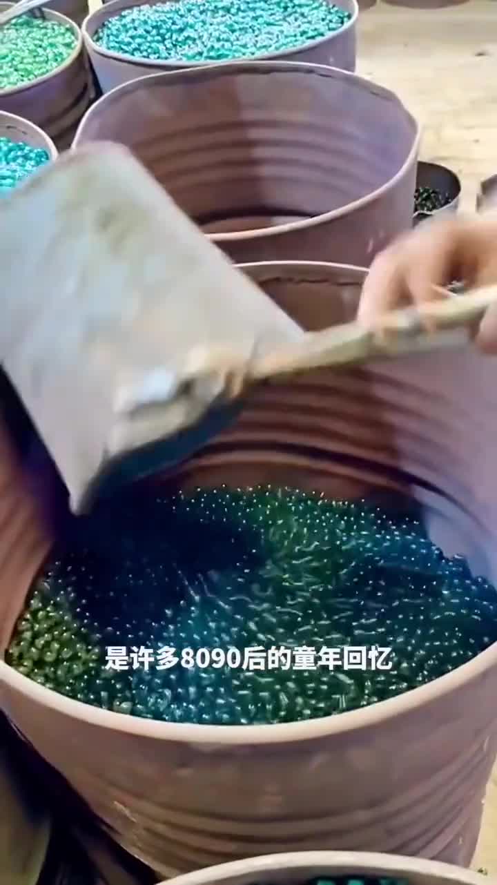 玻璃弹珠魔幻制作过程从回收碎玻璃到绚丽多彩的童年回忆